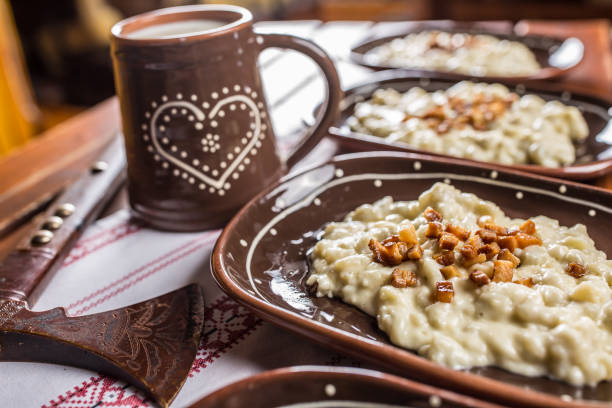Traditional slovakian food halusky with fried bacon and decoration.